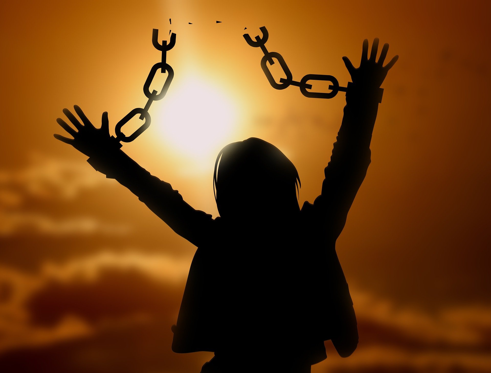 break free chains sunset silhouette