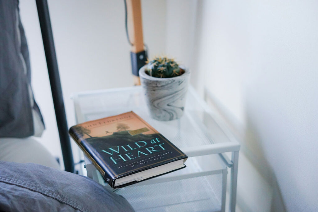 a book on a bedside table