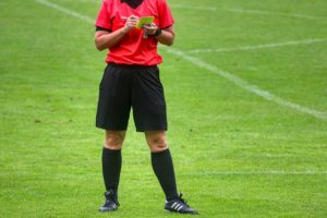 referee football soccer yellow card penalty
